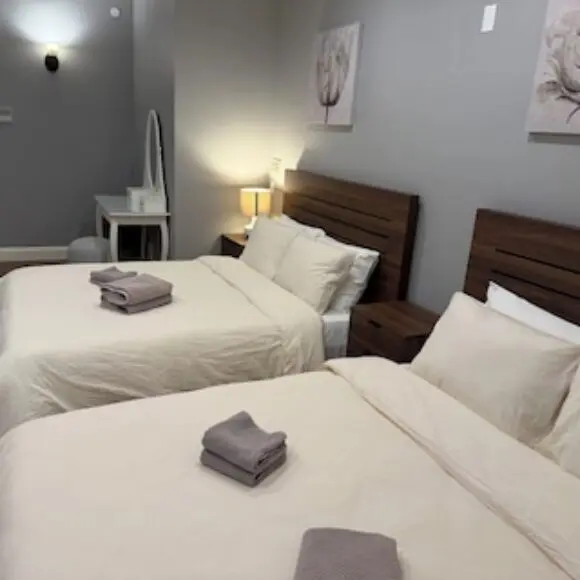 Family Room3 W/ 2 Queen Beds Shared Common Space Private Washroom | hotel Vancouver | Trivago